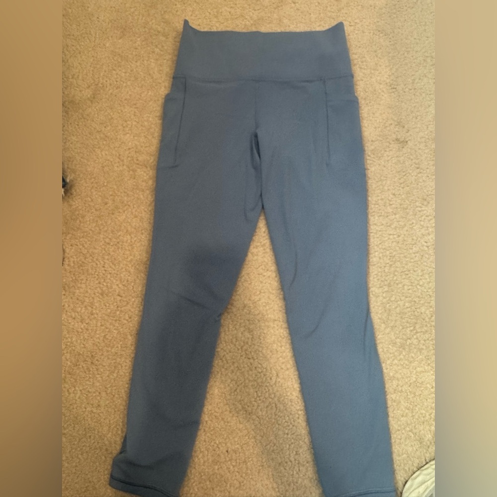 Athleta salutation stash pocket leggings Blue size SMALL
